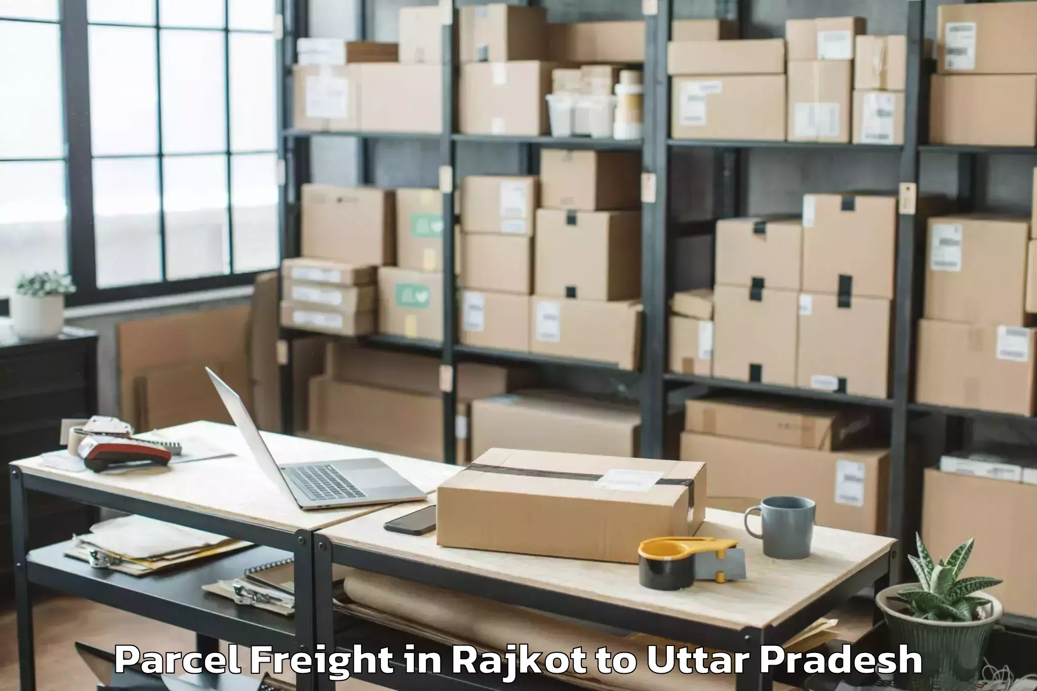 Book Rajkot to Js University Shikohabad Parcel Freight